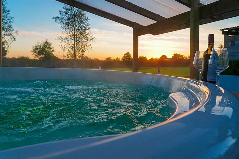 Yurty ahern exterior hot tub with bubbles